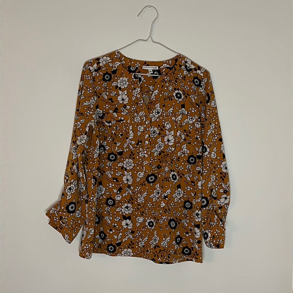 Quarter length floral dress shirt.